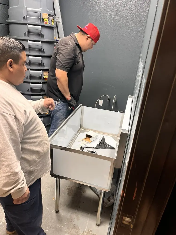Commercial plumbing and sink installation in Millington